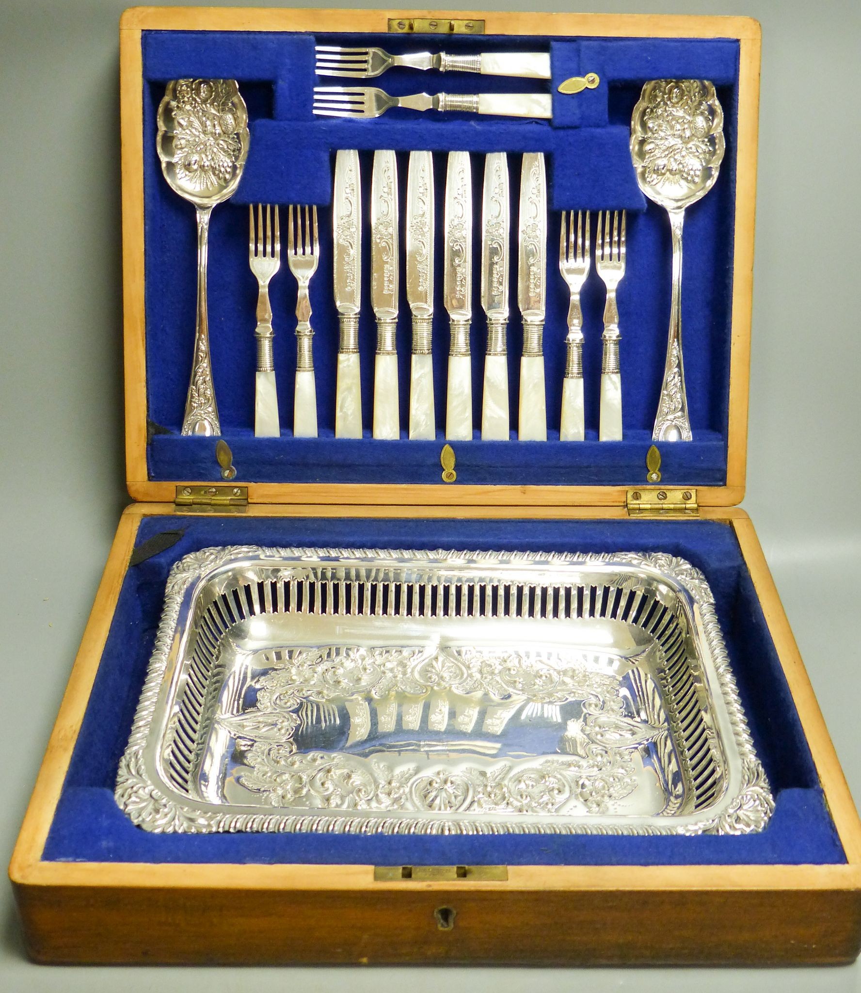 A mahogany cased silver plated dessert set